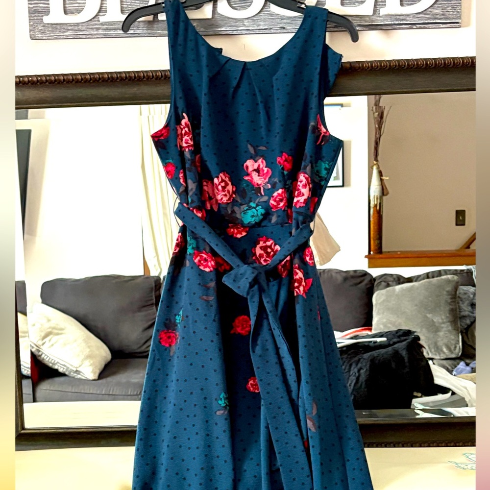 Women’s dress shin length teal color with floral and polkadot patterns